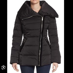 Puffer Jacket
Down-filled, cold-weather essential with asymmetrical zip closure.